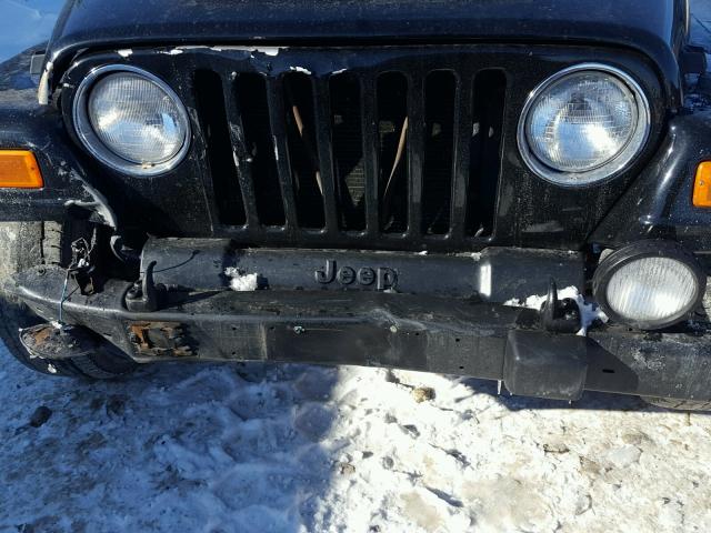 1J4FA59S52P711819 - 2002 JEEP WRANGLER / BLACK photo 9