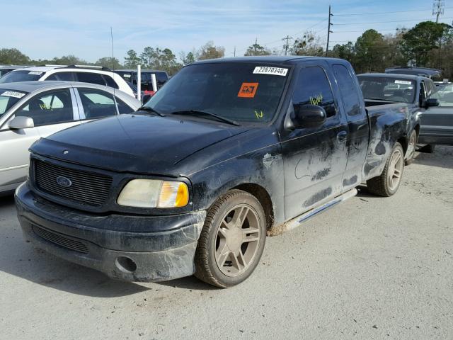 2FTRX07L2YCB12323 - 2000 FORD F150 BLACK photo 2