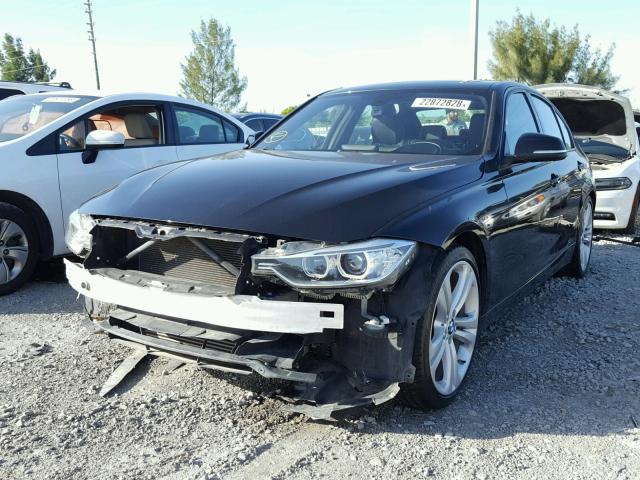 WBA3A9G59CNN67568 - 2012 BMW 335 I BLACK photo 2