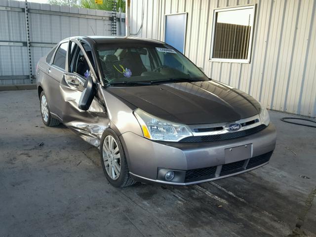 1FAHP37N99W102446 - 2009 FORD FOCUS SEL GRAY photo 1