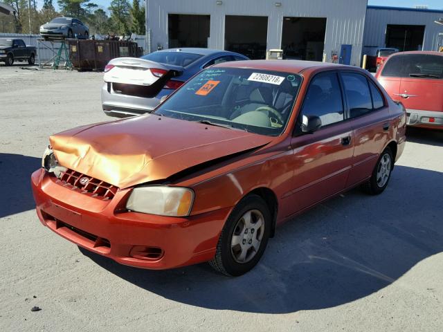 KMHCG45G3YU083073 - 2000 HYUNDAI ACCENT GL ORANGE photo 2