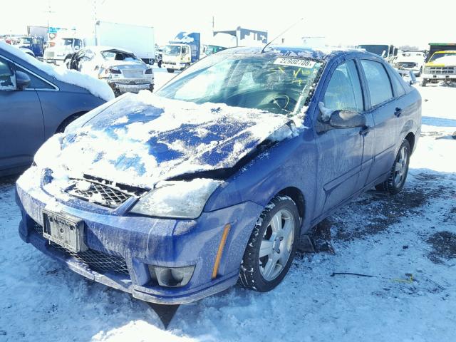 1FAHP34N36W165140 - 2006 FORD FOCUS ZX4 BLUE photo 2