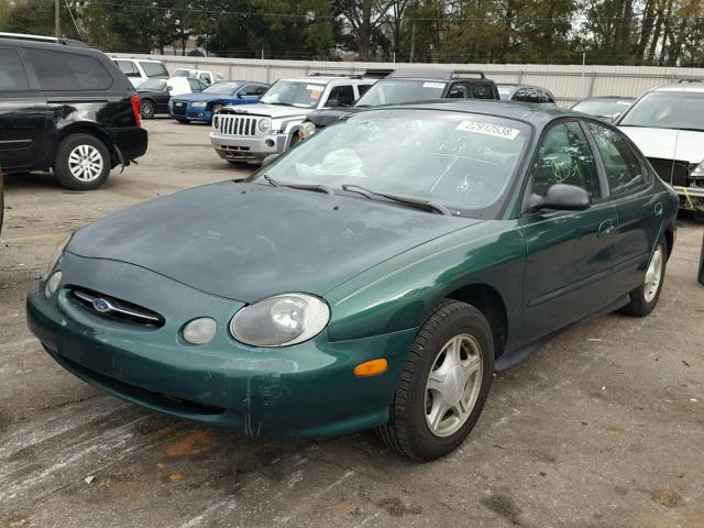 1FAFP52U4XG201328 - 1999 FORD TAURUS LX GREEN photo 2