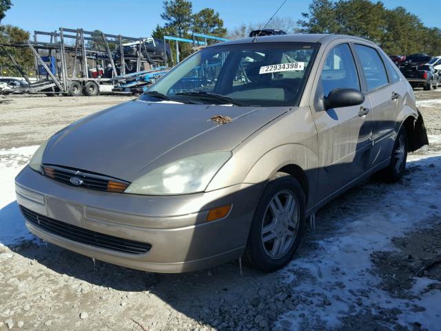 1FAFP34384W112324 - 2004 FORD FOCUS SE C GOLD photo 2