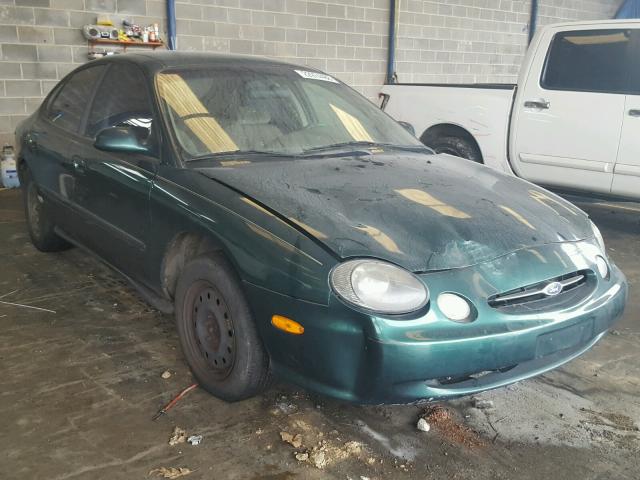 1FAFP53U0XA243223 - 1999 FORD TAURUS SE GREEN photo 1