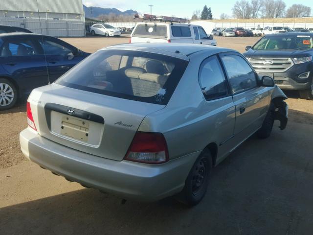 KMHCF35G92U211868 - 2002 HYUNDAI ACCENT L TAN photo 4