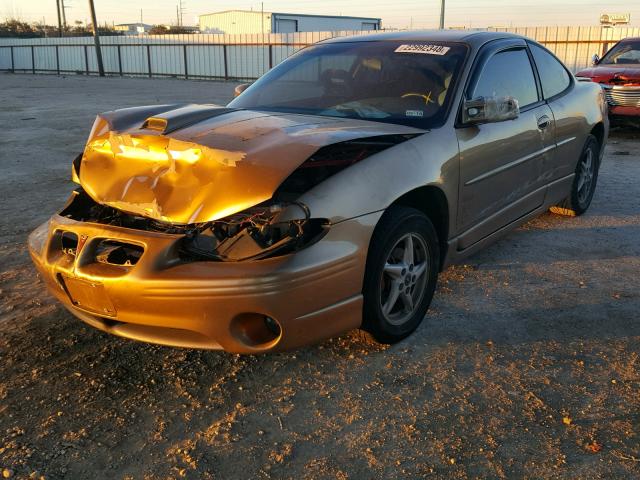 1G2WP12K6XF314399 - 1999 PONTIAC GRAND PRIX GOLD photo 2