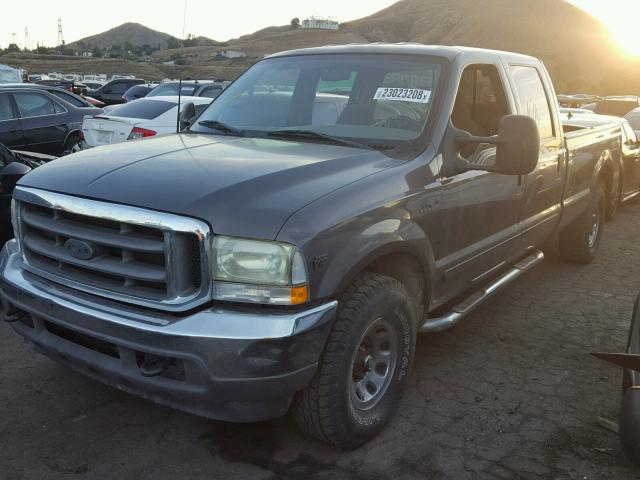 1FTSW30S32ED60671 - 2002 FORD F350 SRW S GRAY photo 2