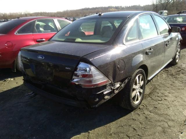 1FAHP24W18G118768 - 2008 FORD TAURUS SEL BLACK photo 4