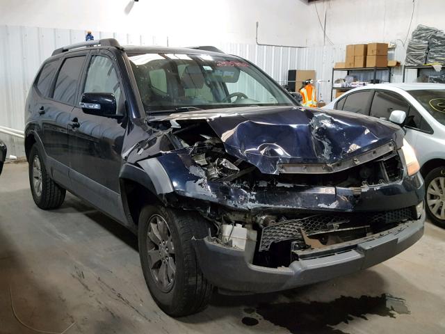 KNDJJ741595035243 - 2009 KIA BORREGO LX BLUE photo 1