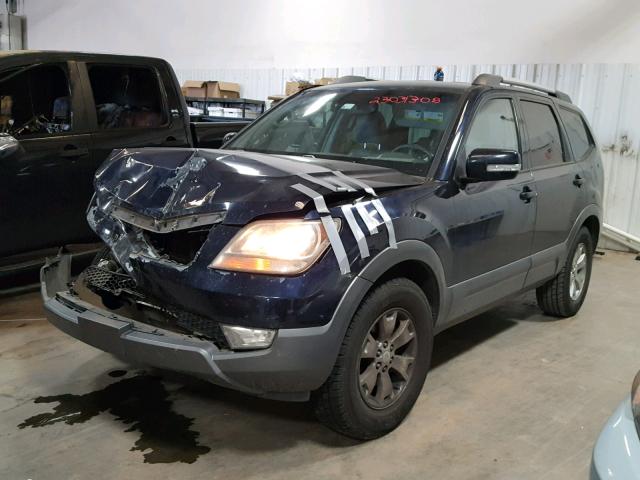 KNDJJ741595035243 - 2009 KIA BORREGO LX BLUE photo 2