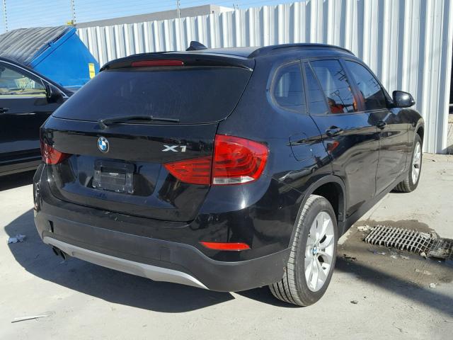 WBAVL1C50EVY19821 - 2014 BMW X1 XDRIVE2 BLACK photo 4