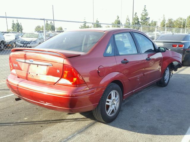 1FAFP34P1YW104316 - 2000 FORD FOCUS SE RED photo 4