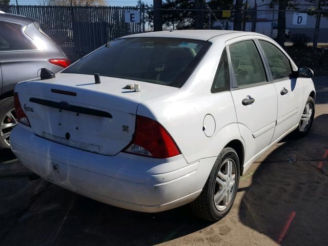 1FAFP34PX1W266757 - 2001 FORD FOCUS SE WHITE photo 4