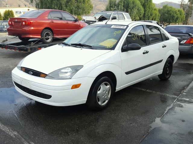 1FAFP33P64W189116 - 2004 FORD FOCUS LX WHITE photo 2