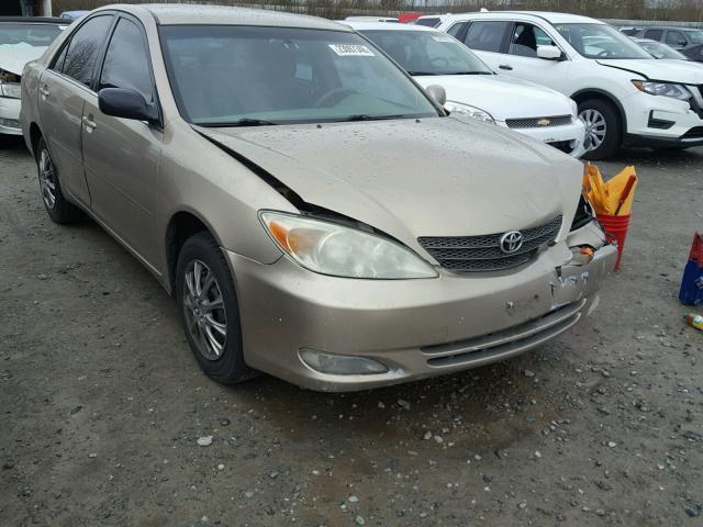 JTDBE32K640279339 - 2004 TOYOTA CAMRY LE GOLD photo 1