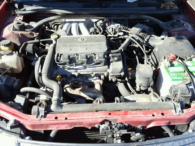 2T1CF22P12C594544 - 2002 TOYOTA CAMRY SOLA RED photo 7