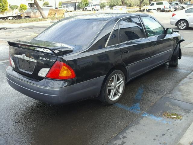 4T1BF28B7YU024577 - 2000 TOYOTA AVALON XL BLACK photo 4