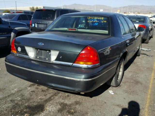 2FAFP74W3XX158623 - 1999 FORD CROWN VICT BLUE photo 4