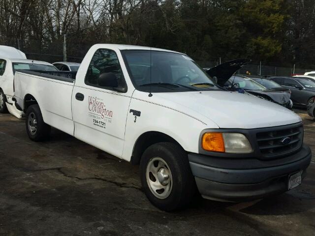 2FTRF17264CA09013 - 2004 FORD F-150 HERI WHITE photo 1