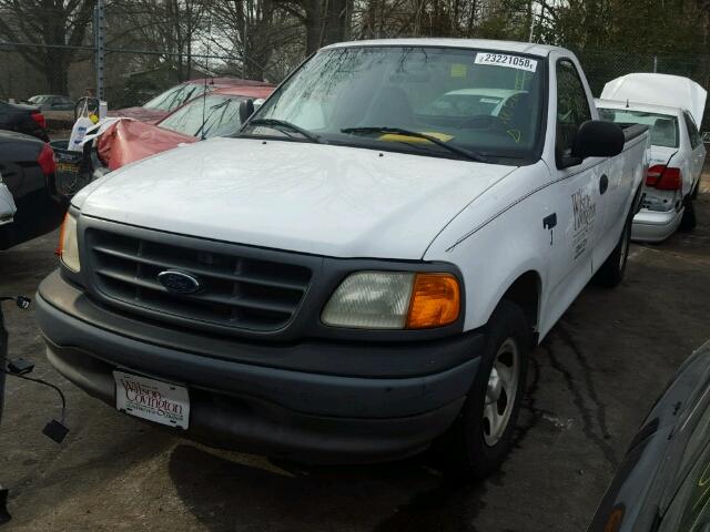 2FTRF17264CA09013 - 2004 FORD F-150 HERI WHITE photo 2