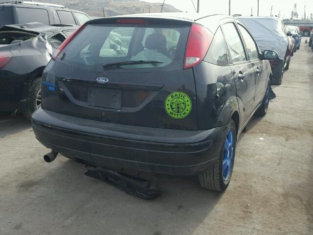 1FAHP37N67W316520 - 2007 FORD FOCUS ZX5 BLACK photo 4