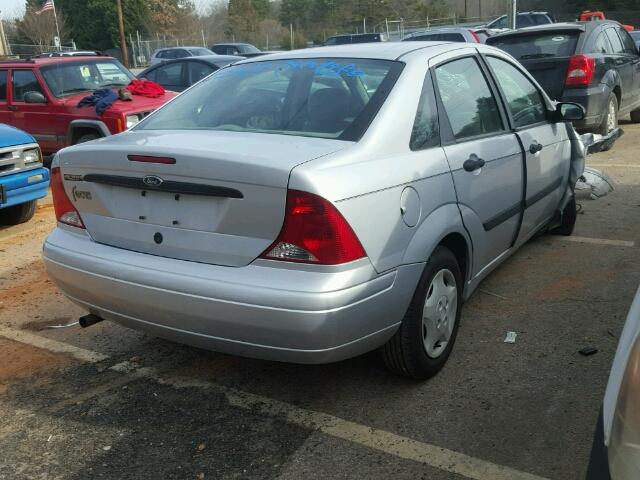 1FAFP33PX1W321998 - 2001 FORD FOCUS LX GRAY photo 4