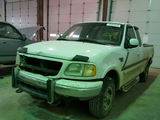 1FTRX18L4YKA11042 - 2000 FORD F150 WHITE photo 2