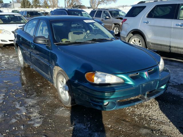 1G2NW52E1XM865772 - 1999 PONTIAC GRAND AM G GREEN photo 1