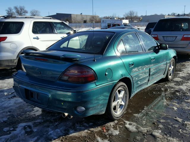 1G2NW52E1XM865772 - 1999 PONTIAC GRAND AM G GREEN photo 4