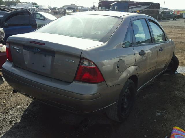 1FAFP34N25W145354 - 2005 FORD FOCUS ZX4 TAN photo 4