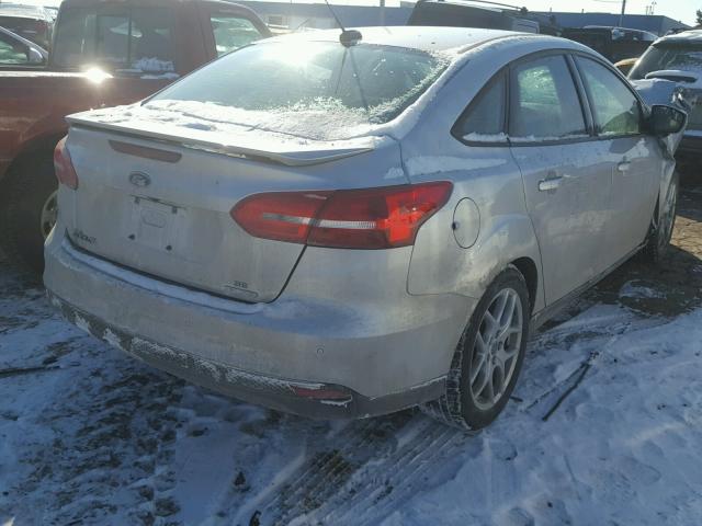 1FADP3F22FL218400 - 2015 FORD FOCUS SE SILVER photo 4