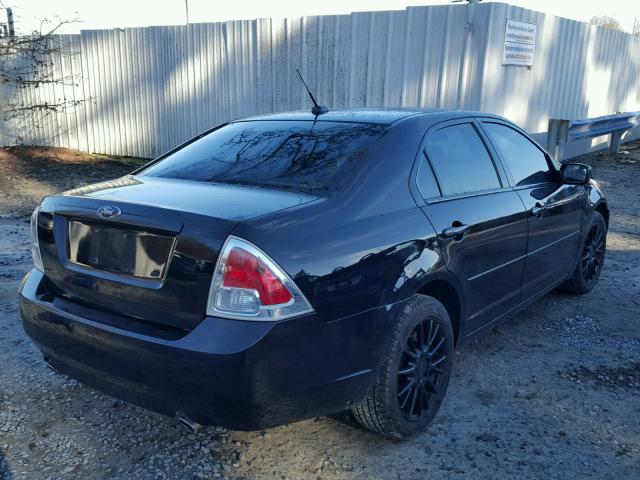 3FAHP08129R210582 - 2009 FORD FUSION SEL BLACK photo 4