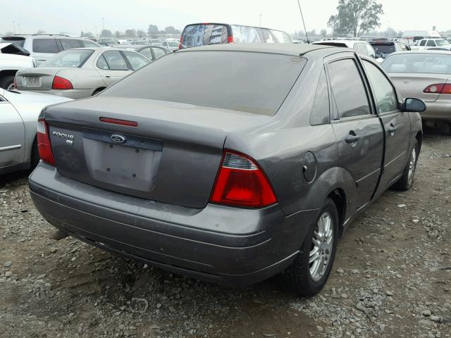 1FAFP34N37W284508 - 2007 FORD FOCUS ZX4 GRAY photo 4