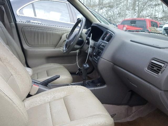 JNKCP11A2XT010817 - 1999 INFINITI G20 TAN photo 5