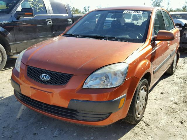 KNADE223X96462000 - 2009 KIA RIO BASE ORANGE photo 2