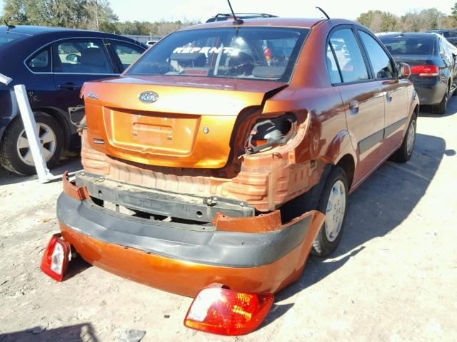 KNADE223X96462000 - 2009 KIA RIO BASE ORANGE photo 4