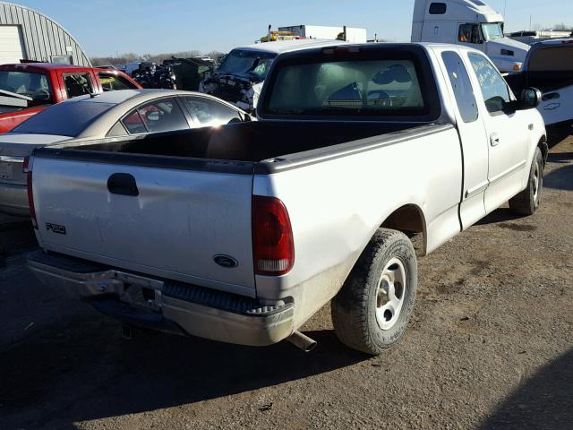 1FTZX1725YKA53910 - 2000 FORD F150 SILVER photo 4