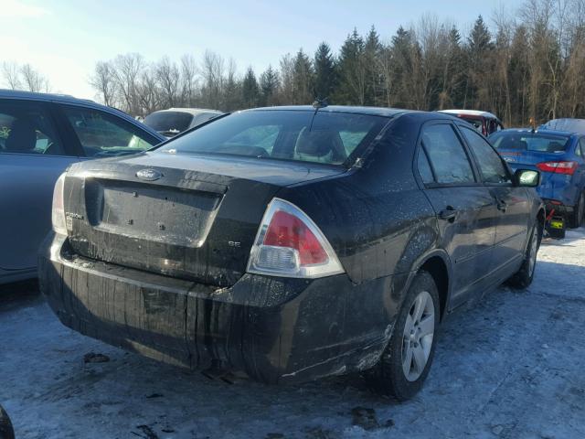 3FAHP07Z49R111883 - 2009 FORD FUSION SE BLACK photo 4