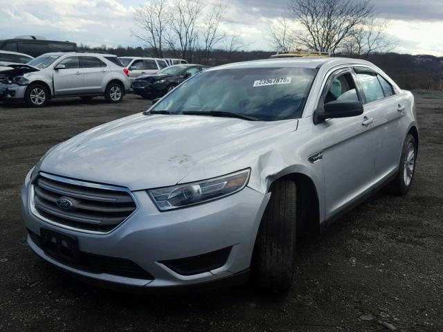 1FAHP2D89GG135883 - 2016 FORD TAURUS SE SILVER photo 2