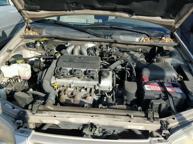 JT2BF22K3X0167618 - 1999 TOYOTA CAMRY LE GOLD photo 7