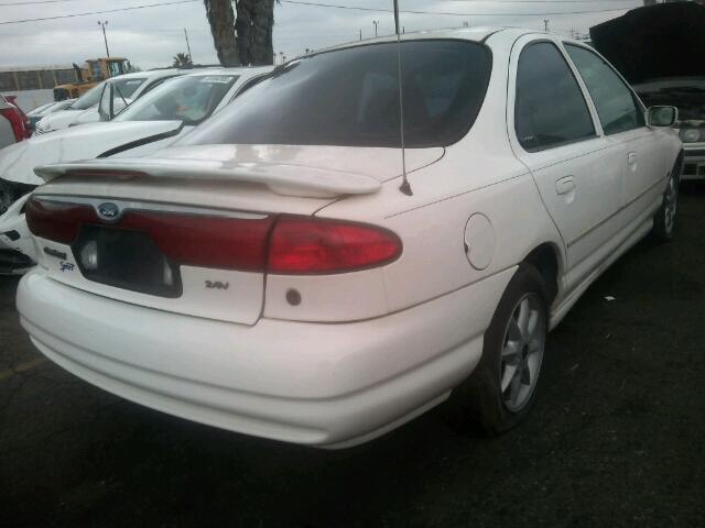 1FAFP66L2XK111387 - 1999 FORD CONTOUR SE WHITE photo 4