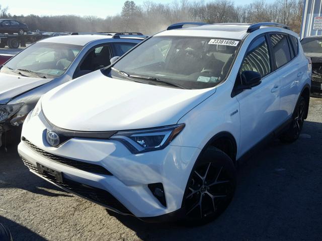 JTMJJREV4HD140065 - 2017 TOYOTA RAV4 HV SE WHITE photo 2