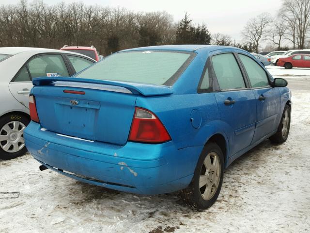 1FAHP34N77W153977 - 2007 FORD FOCUS ZX4 BLUE photo 4