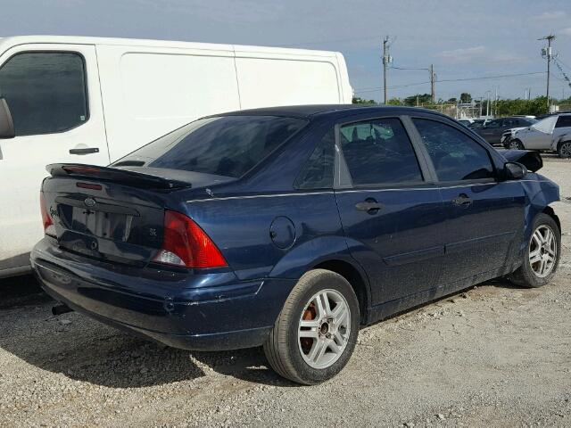 1FAFP34P81W332755 - 2001 FORD FOCUS SE BLUE photo 4