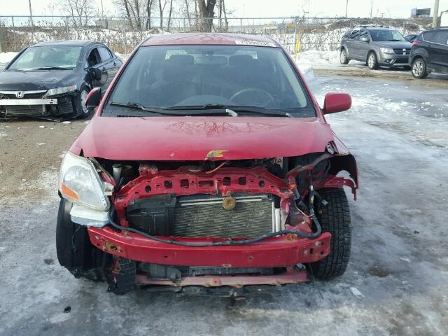 JTDBT923381256814 - 2008 TOYOTA YARIS RED photo 9