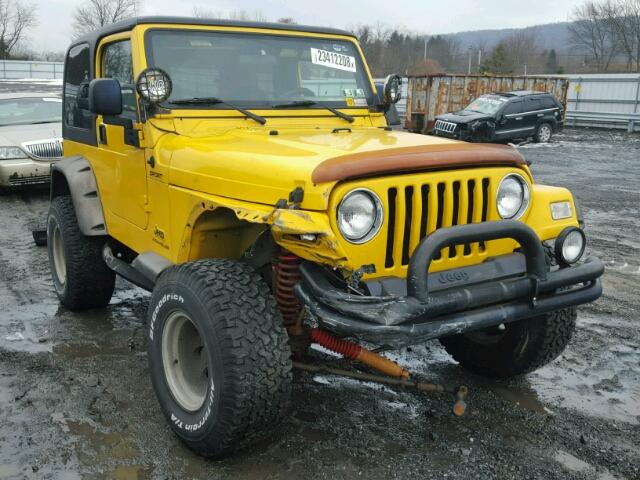 1J4FA49SX4P729603 - 2004 JEEP WRANGLER / YELLOW photo 1