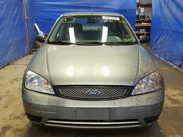 1FAFP34N05W304386 - 2005 FORD FOCUS ZX4 GREEN photo 9