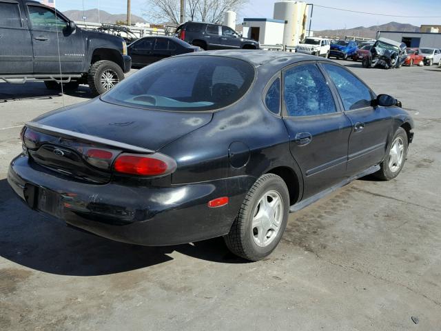 1FAFP53U5XG162358 - 1999 FORD TAURUS SE BLACK photo 4