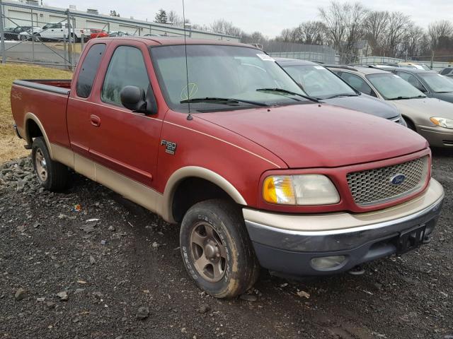 1FTRX18WXYNA75451 - 2000 FORD F150 BURGUNDY photo 1